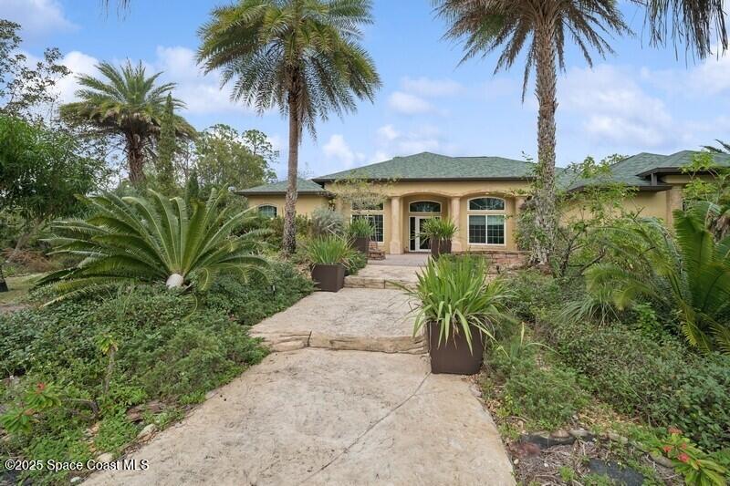 2739 Harlock Road Melbourne, FL 32934 - Photo 1 of 15 01_2739HarlockRd_57_FrontView_FlexMLS800