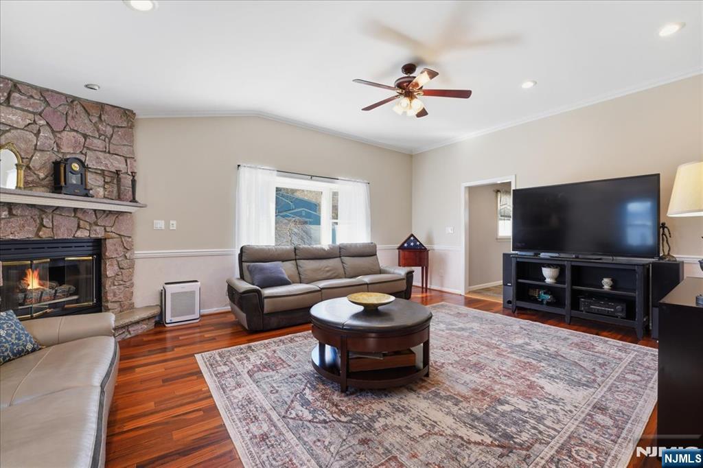 72 West Saddle River Road Waldwick, NJ 07463 - Photo 16 of 50 a living room with furniture and a flat screen tv