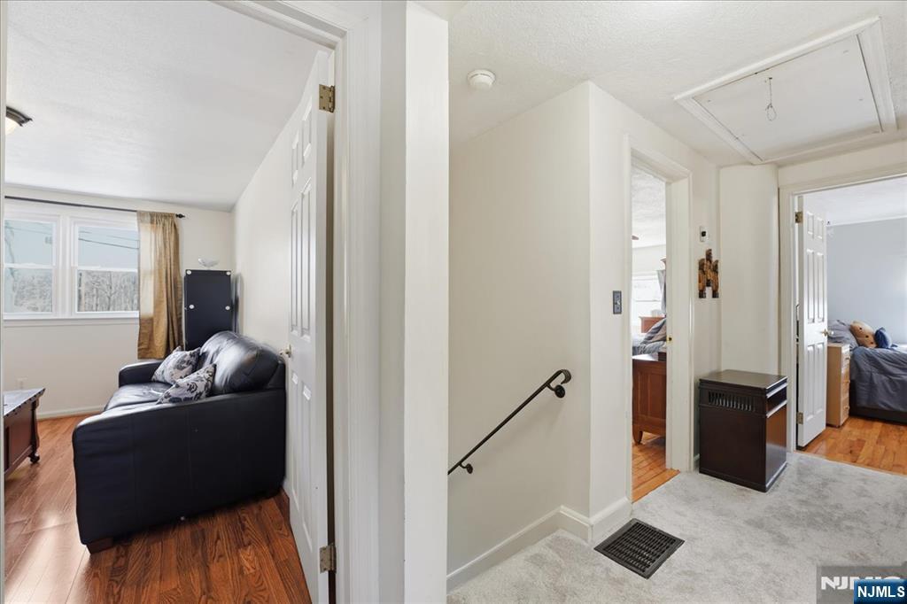 72 West Saddle River Road Waldwick, NJ 07463 - Photo 21 of 50 a living room with furniture and a window