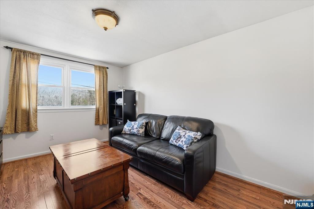 72 West Saddle River Road Waldwick, NJ 07463 - Photo 23 of 50 a living room with furniture and a window