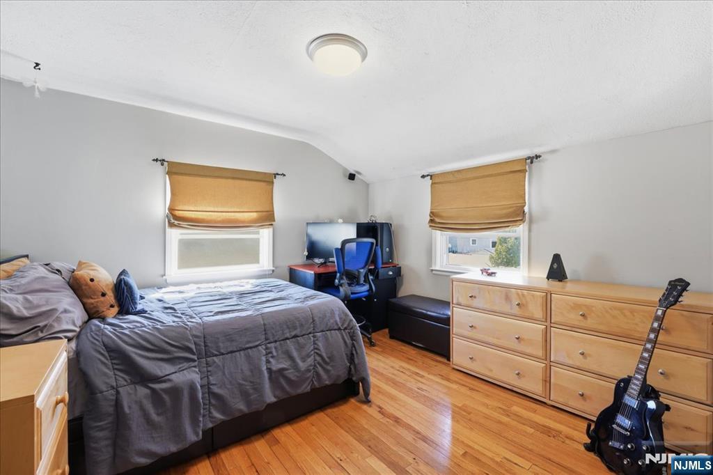 72 West Saddle River Road Waldwick, NJ 07463 - Photo 29 of 50 a bedroom with a bed and a dresser