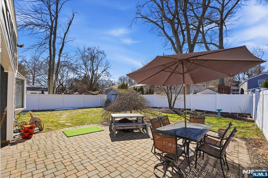 72 West Saddle River Road Waldwick, NJ 07463 - Photo 34 of 50 a view of a swimming pool with sitting area