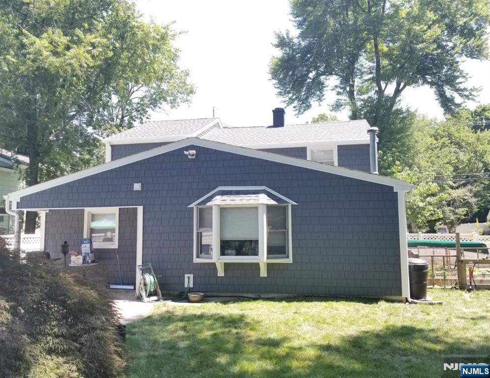 72 West Saddle River Road Waldwick, NJ 07463 - Photo 35 of 50 a front view of a house with a yard