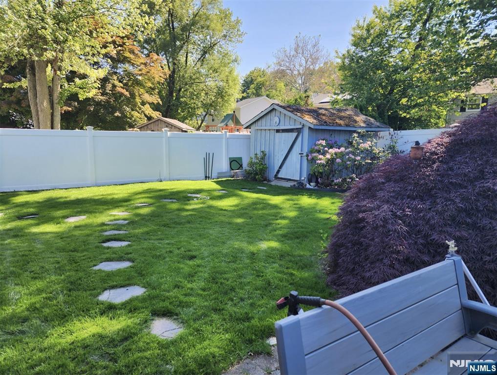 72 West Saddle River Road Waldwick, NJ 07463 - Photo 37 of 50 a backyard of a house with lots of green space