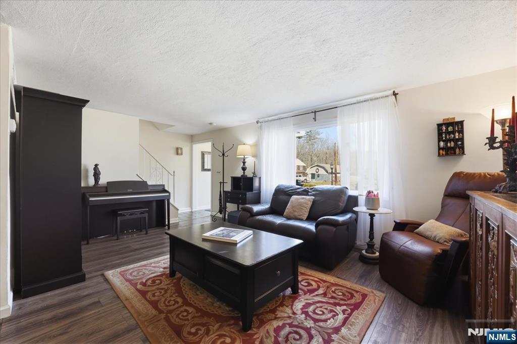 72 West Saddle River Road Waldwick, NJ 07463 - Photo 6 of 50 a living room with furniture and a wooden floor