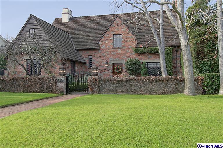 1895 Virginia Road San Marino, CA 91108 - Photo 1 of 45 a front view of house with yard and trees in the background