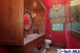 1895 Virginia Road San Marino, CA 91108 - Photo 14 of 45 a bathroom with a sink vanity mirror and toilet