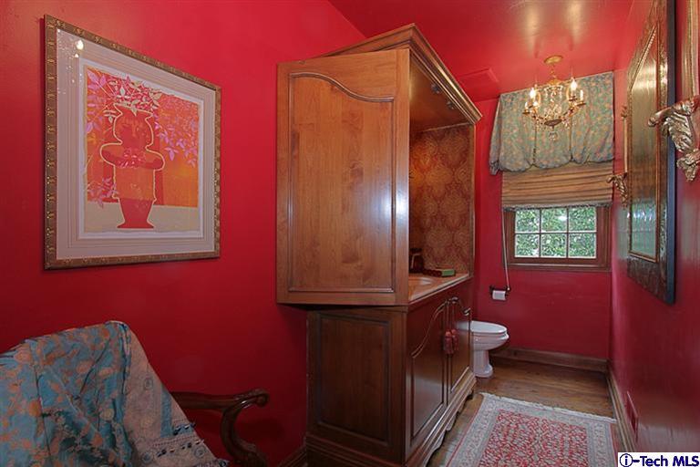 1895 Virginia Road San Marino, CA 91108 - Photo 15 of 45 a bathroom with a sink a mirror and a window