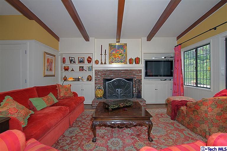 1895 Virginia Road San Marino, CA 91108 - Photo 22 of 45 a living room with furniture and a fireplace