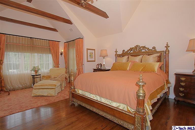 1895 Virginia Road San Marino, CA 91108 - Photo 25 of 45 a bedroom with a bed and wooden floor