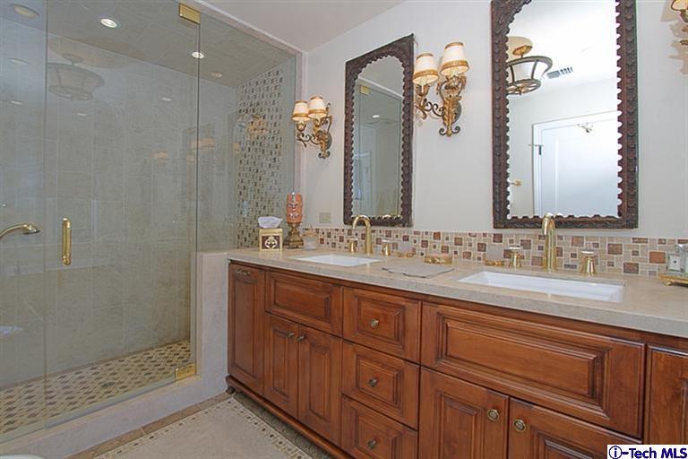 1895 Virginia Road San Marino, CA 91108 - Photo 30 of 45 a bathroom with double sink and a mirror