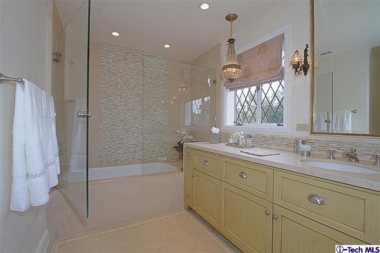 1895 Virginia Road San Marino, CA 91108 - Photo 32 of 45 a bathroom with a tub sink shower and mirror