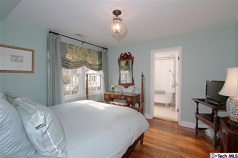 1895 Virginia Road San Marino, CA 91108 - Photo 33 of 45 a bedroom with a bed and wooden floor