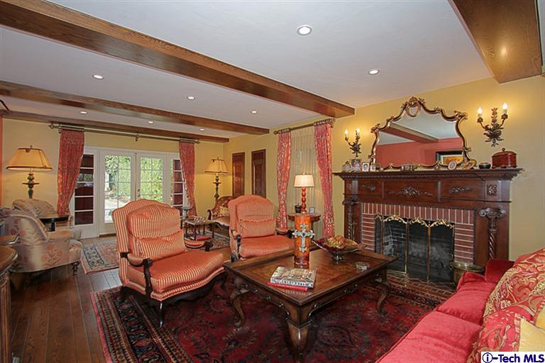 1895 Virginia Road San Marino, CA 91108 - Photo 8 of 45 a living room with furniture a fireplace and wooden floor