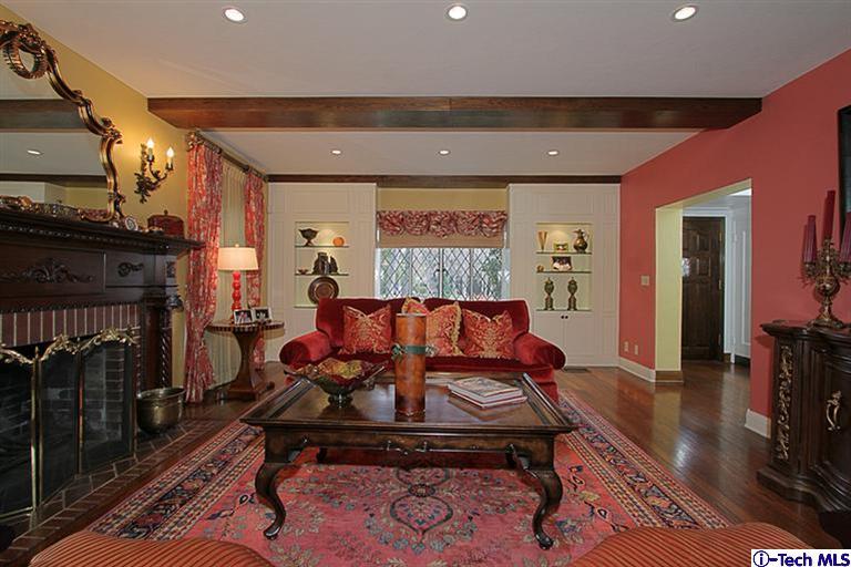 1895 Virginia Road San Marino, CA 91108 - Photo 9 of 45 a living room with furniture a rug and a fireplace
