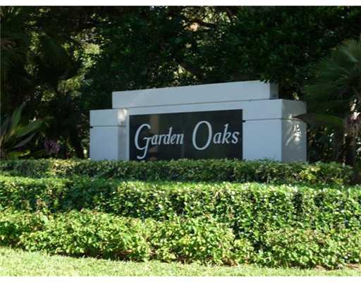 8465 Beaconhill Road Palm Beach Gardens, FL 33410 - Photo 33 of 37 Garden Oaks entrance sign