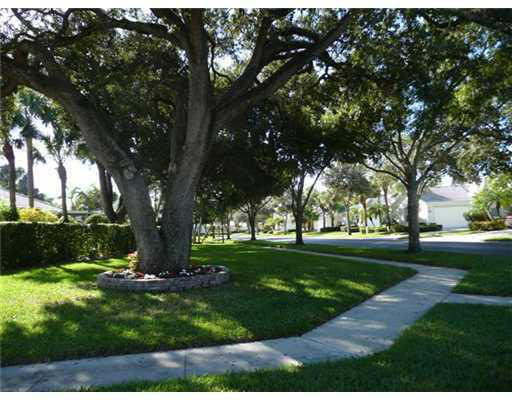 8465 Beaconhill Road Palm Beach Gardens, FL 33410 - Photo 35 of 37 Garden Oaks street scene