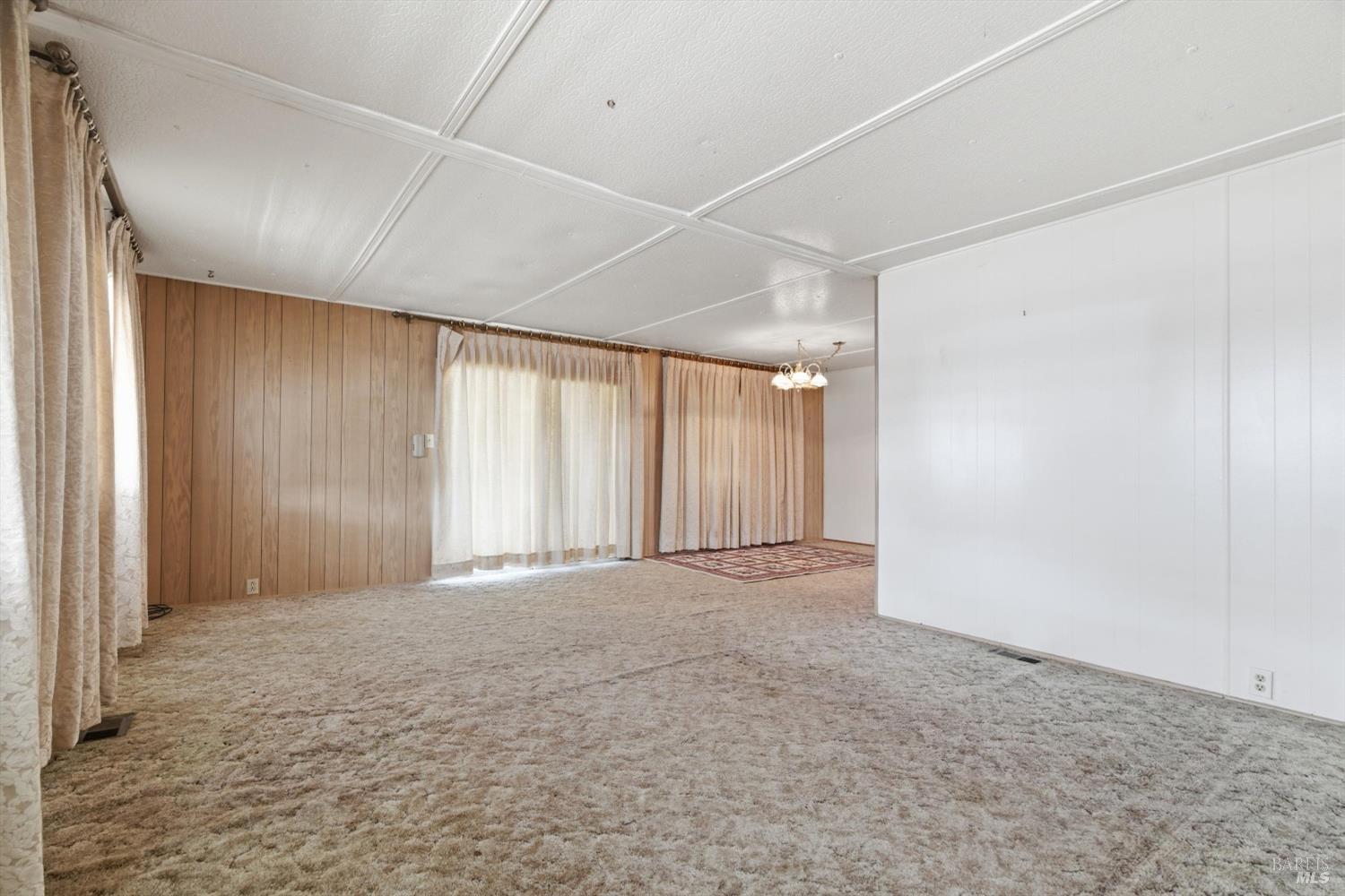 305 Aileen Avenue Santa Rosa, CA 95407 - Photo 5 of 15 an empty room with windows and closet