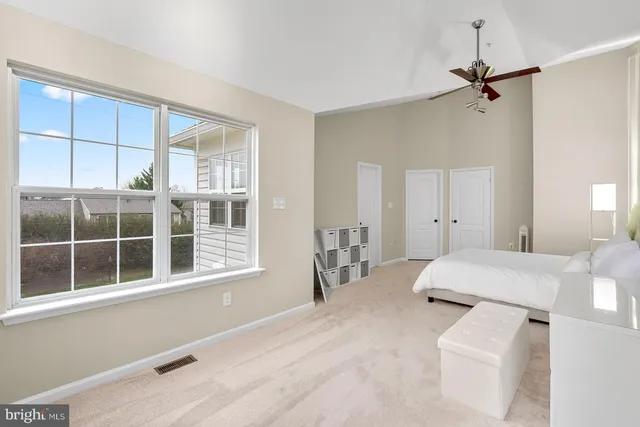 a living room with furniture and window