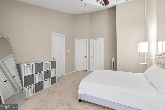 a bedroom with a bed and closet