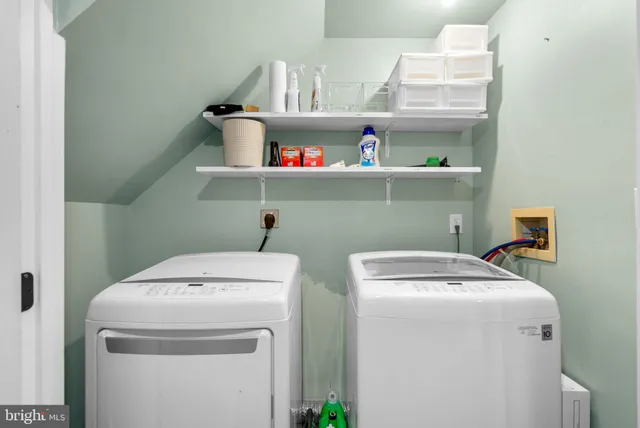 a utility room with dryer and washer