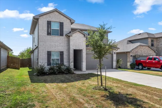 a house view with a garden space