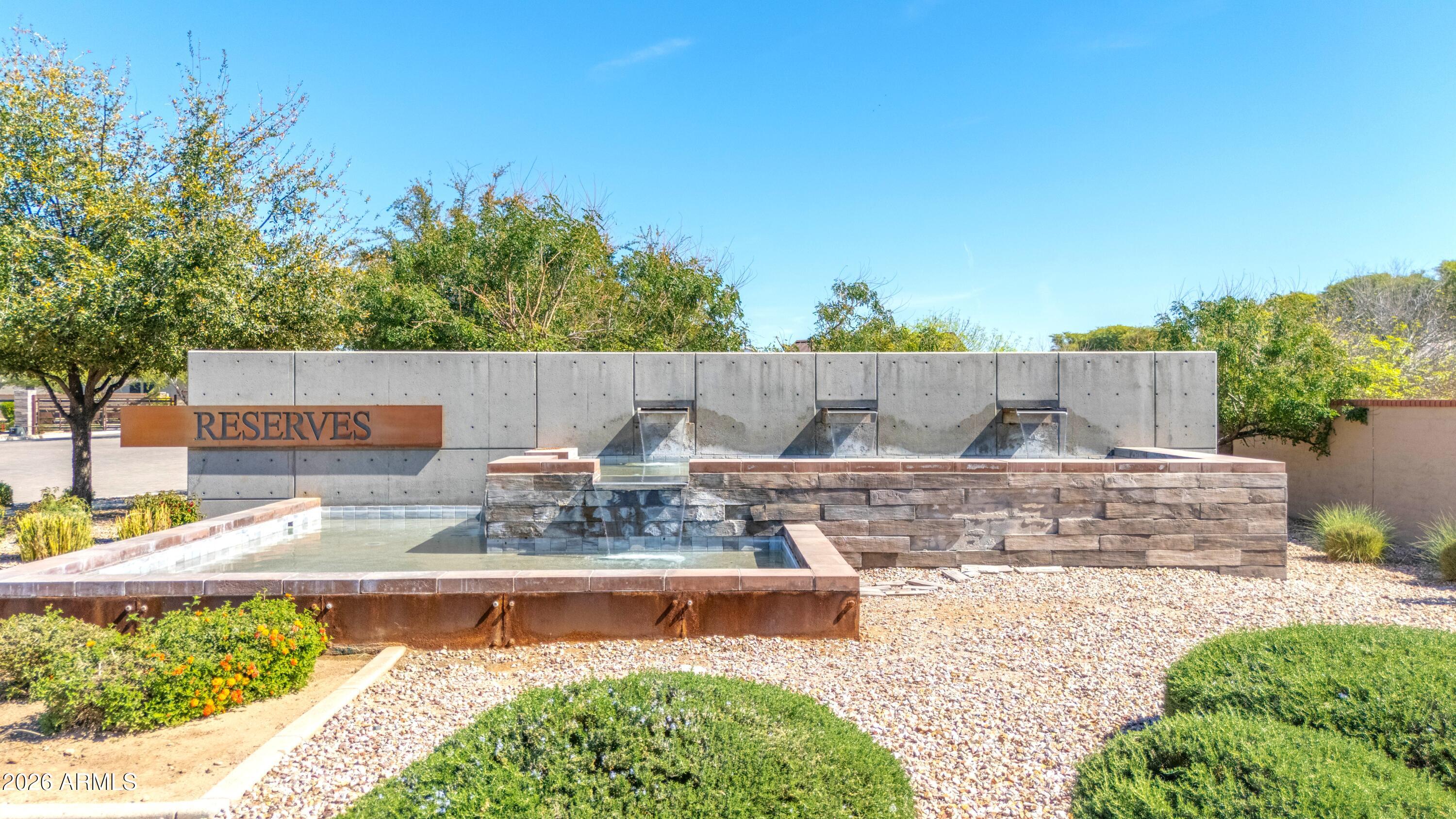 1867 East Gillcrest Road Gilbert, AZ 85298 - Photo 1 of 48 a view of swimming pool with outdoor seating and plants