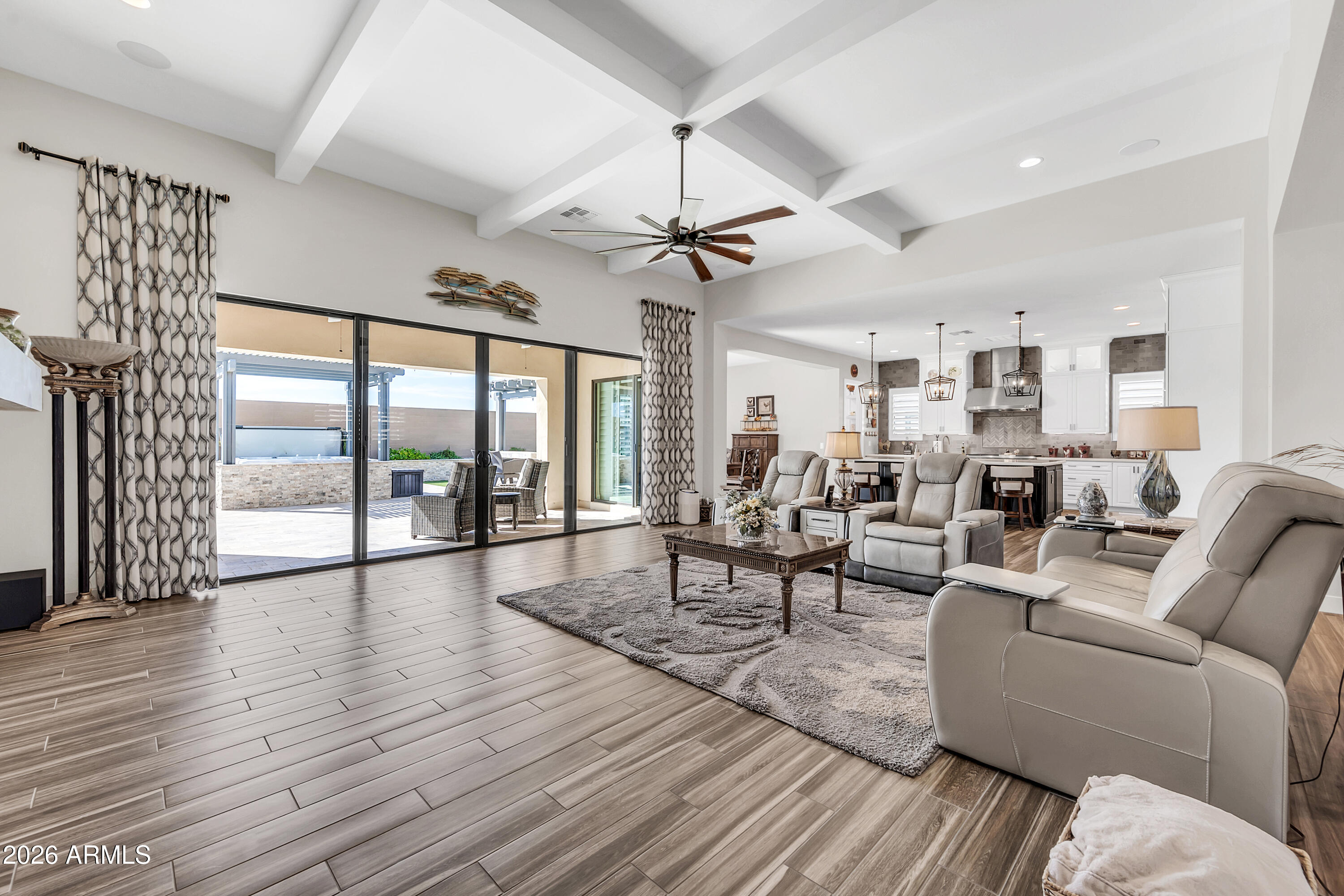 1867 East Gillcrest Road Gilbert, AZ 85298 - Photo 10 of 48 a living room with furniture large window and wooden floor