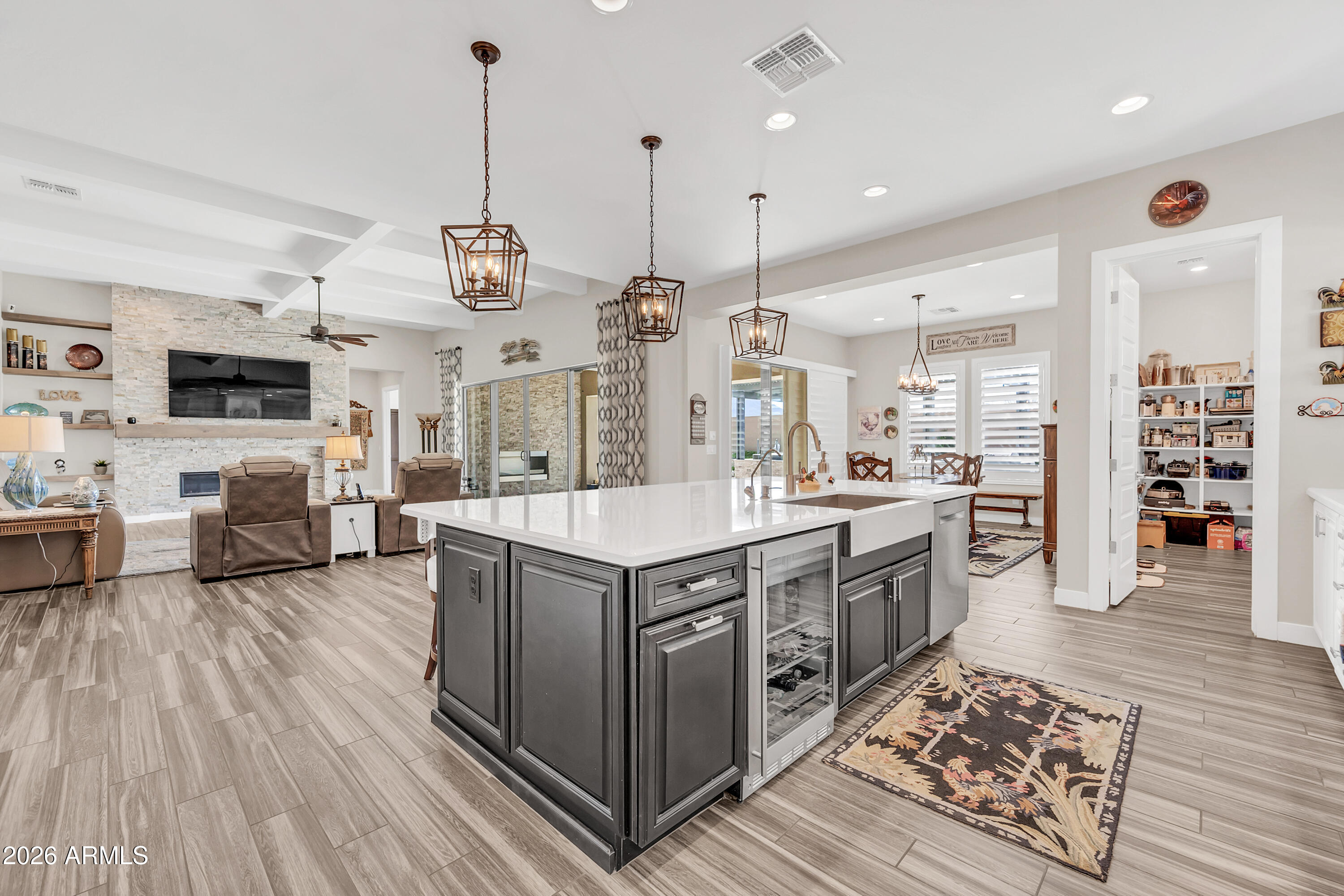 1867 East Gillcrest Road Gilbert, AZ 85298 - Photo 15 of 48 a kitchen with stainless steel appliances granite countertop a stove and cabinets