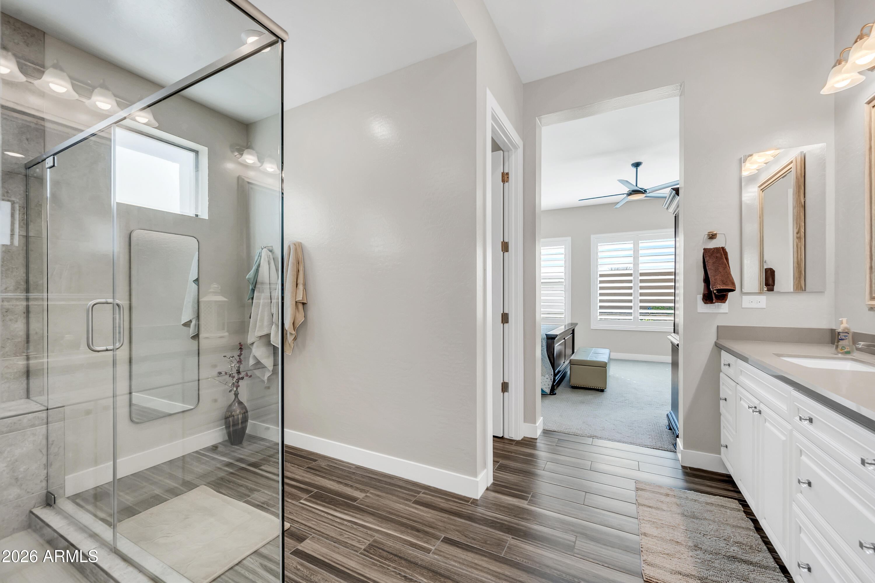 1867 East Gillcrest Road Gilbert, AZ 85298 - Photo 21 of 48 a bathroom with a double vanity sink toilet and shower