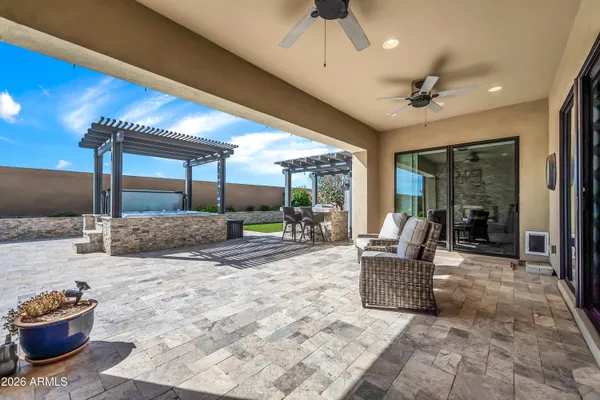 a lobby with furniture and floor to ceiling window
