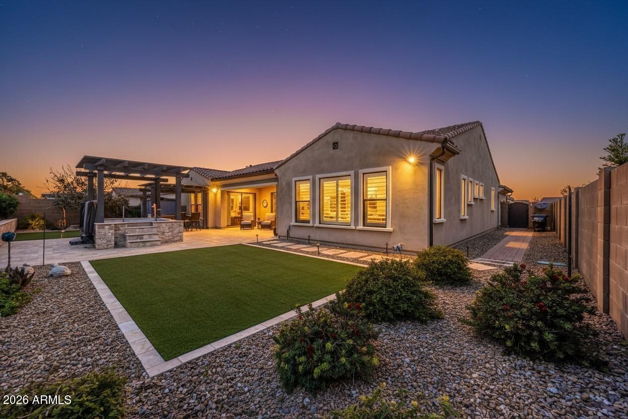 1867 East Gillcrest Road Gilbert, AZ 85298 - Photo 39 of 48 a front view of a house with a garden
