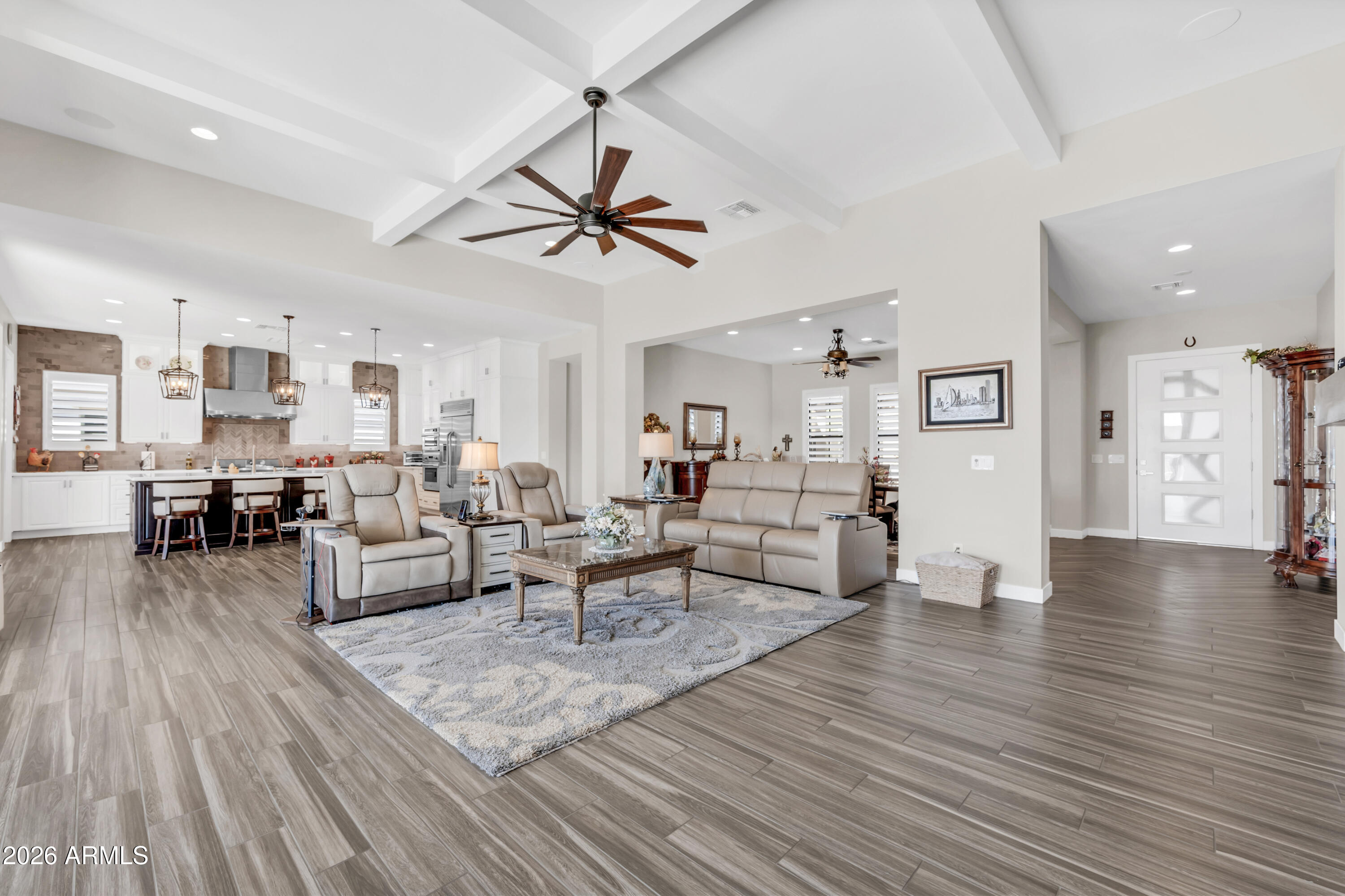 1867 East Gillcrest Road Gilbert, AZ 85298 - Photo 8 of 48 a living room with furniture and wooden floor