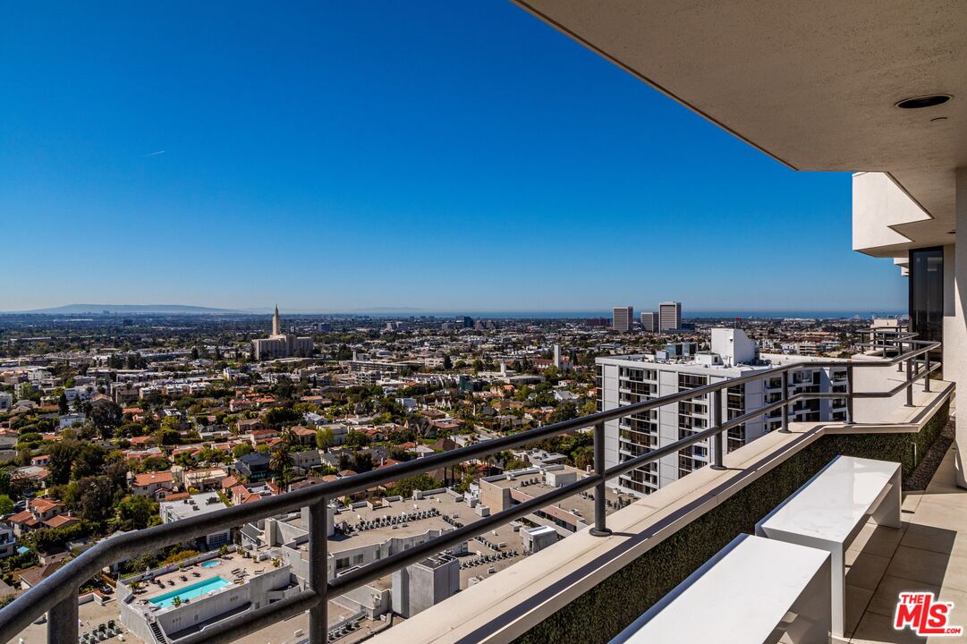10601 Wilshire Boulevard, Unit 19E Los Angeles, CA 90024 - Photo 12 of 38 a city view from a balcony
