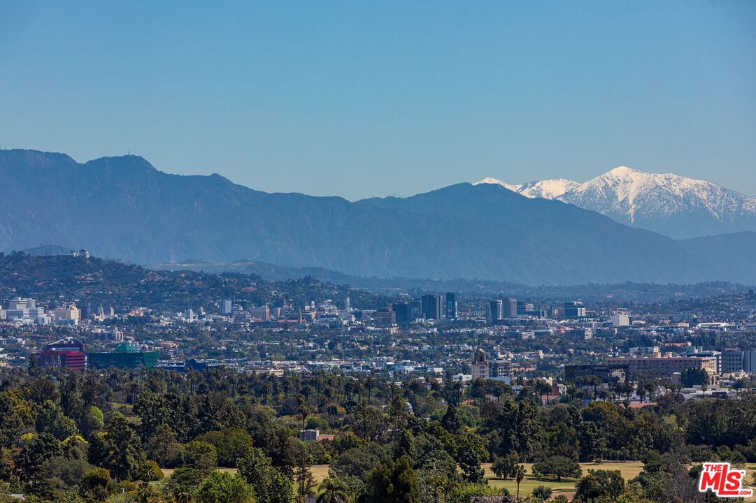 10601 Wilshire Boulevard, Unit 19E Los Angeles, CA 90024 - Photo 17 of 38 an aerial view of residential house and mountain view