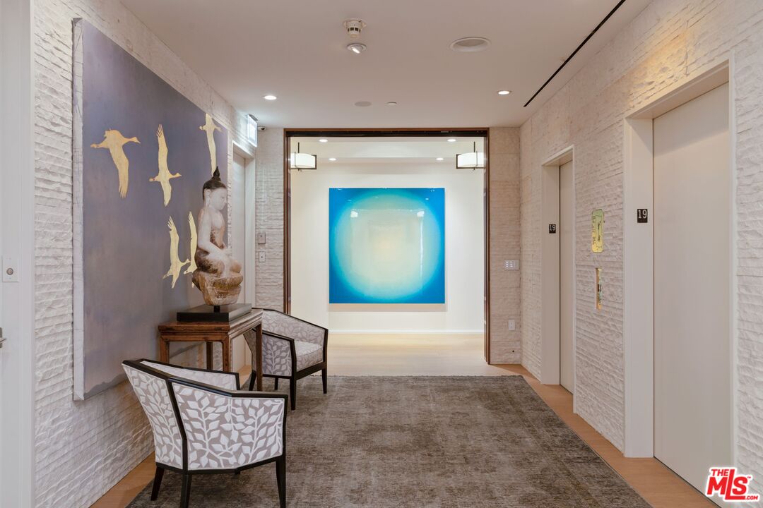 10601 Wilshire Boulevard, Unit 19E Los Angeles, CA 90024 - Photo 2 of 38 a view of a hallway with furniture and entryway