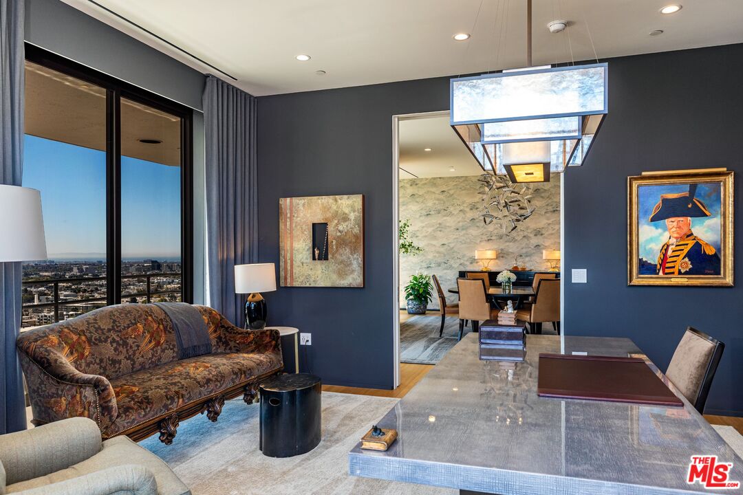 10601 Wilshire Boulevard, Unit 19E Los Angeles, CA 90024 - Photo 22 of 38 a living room with furniture
