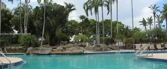 a view of a park with palm trees