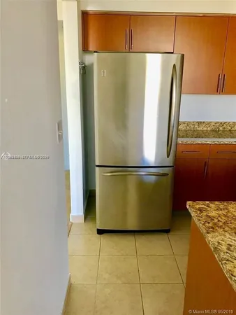 a close view of a refrigerator in kitchen