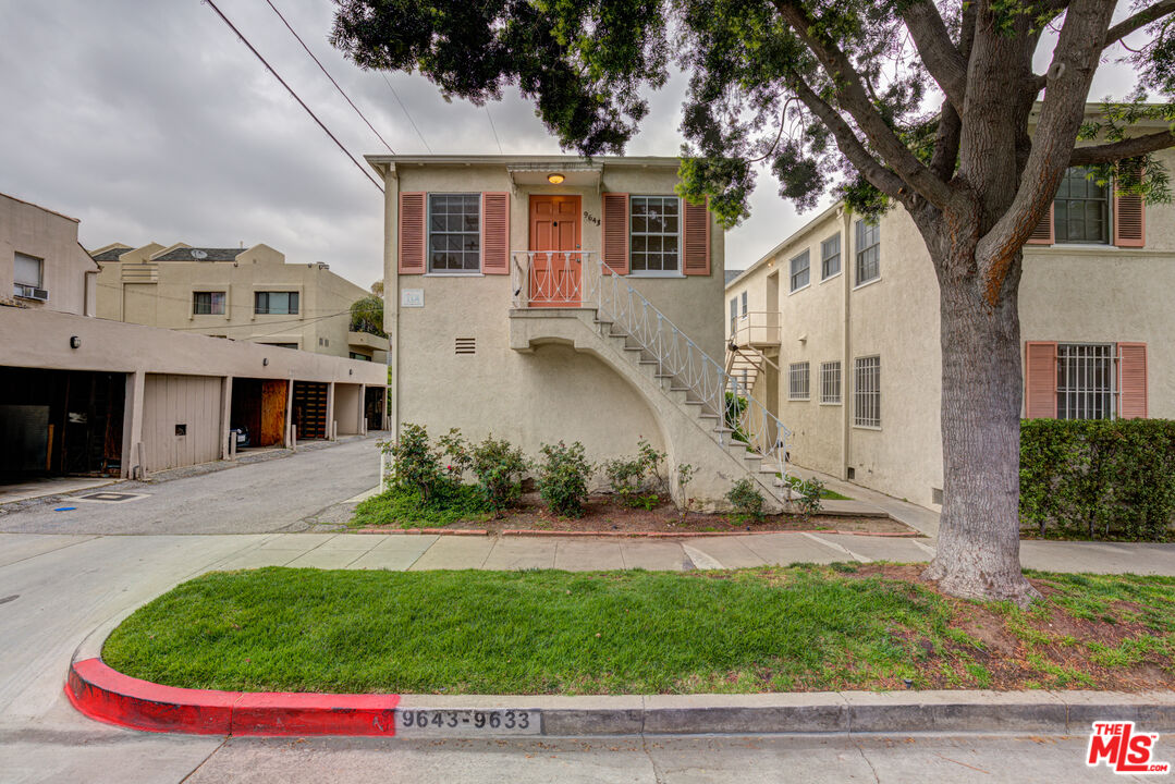 9643 Charleville Boulevard Beverly Hills, CA 90212 - Photo 21 of 21 a view of a house with a yard