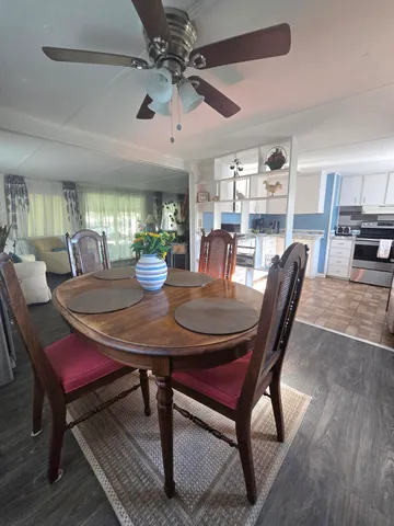 a view of a dining room with furniture