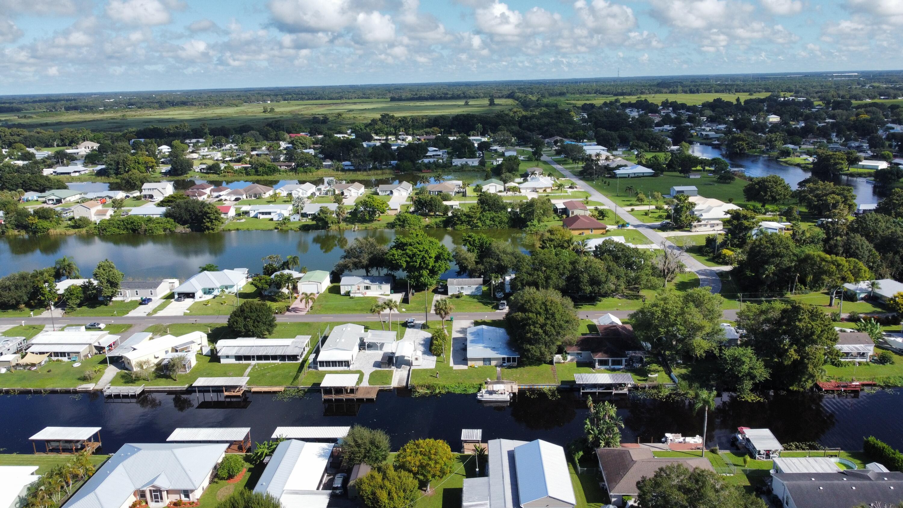 2612 Southeast 29th Street Okeechobee, FL 34974 - Photo 43 of 46 a view of a lake with a city