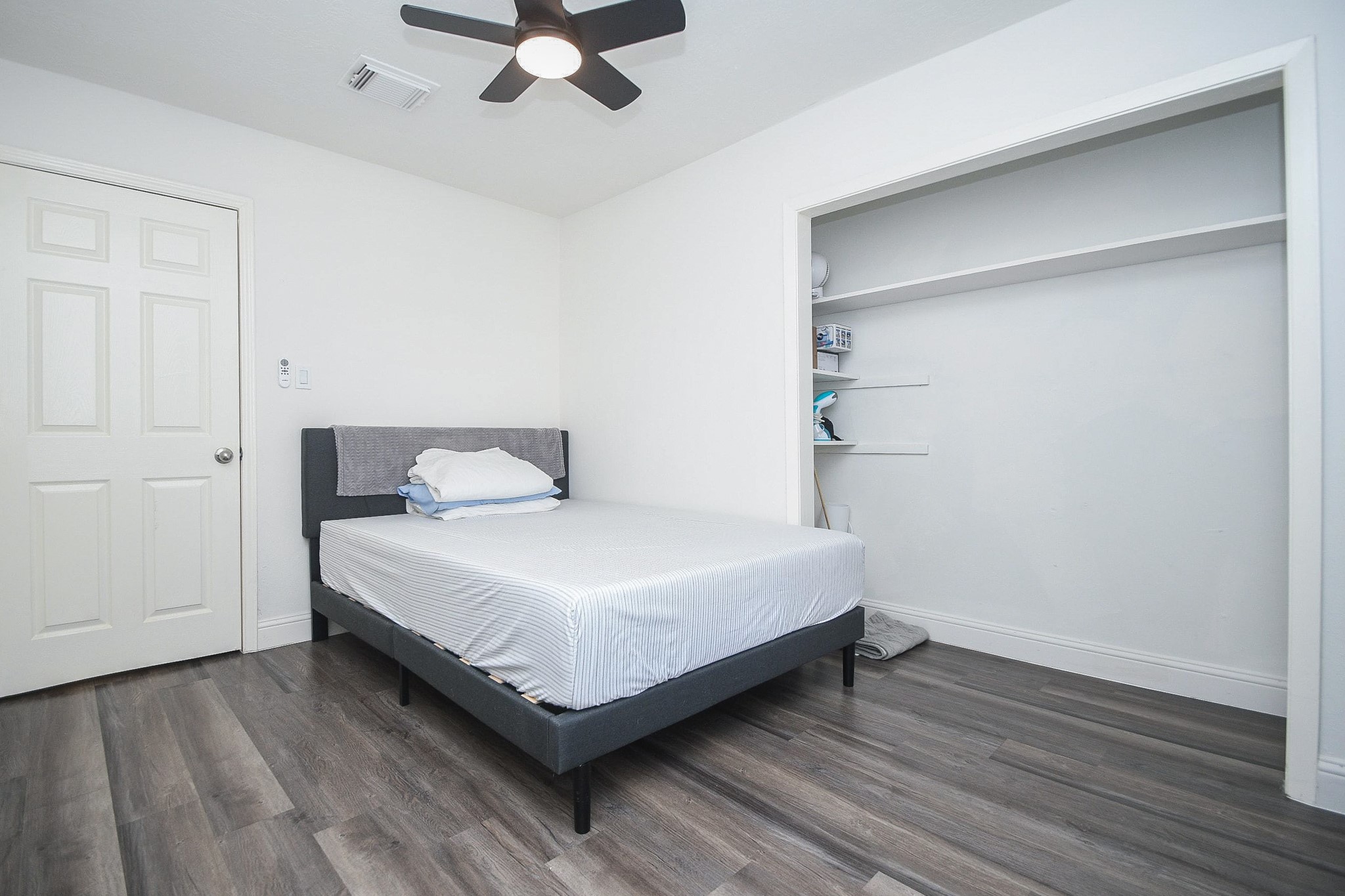 11443 Newbrook Drive Houston, TX 77072 - Photo 23 of 31 a bedroom with a bed and window