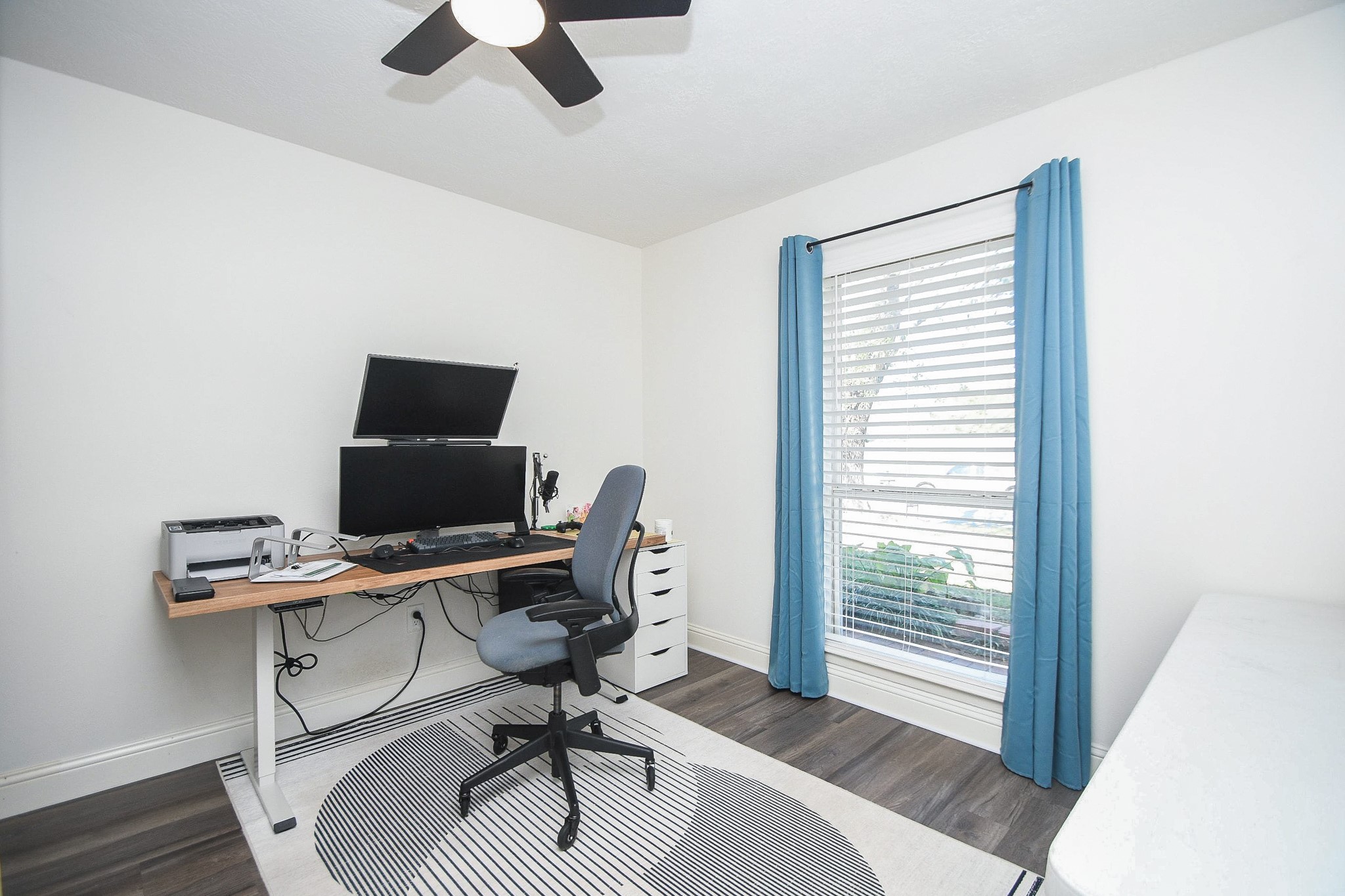 11443 Newbrook Drive Houston, TX 77072 - Photo 24 of 31 a workspace with furniture and a window