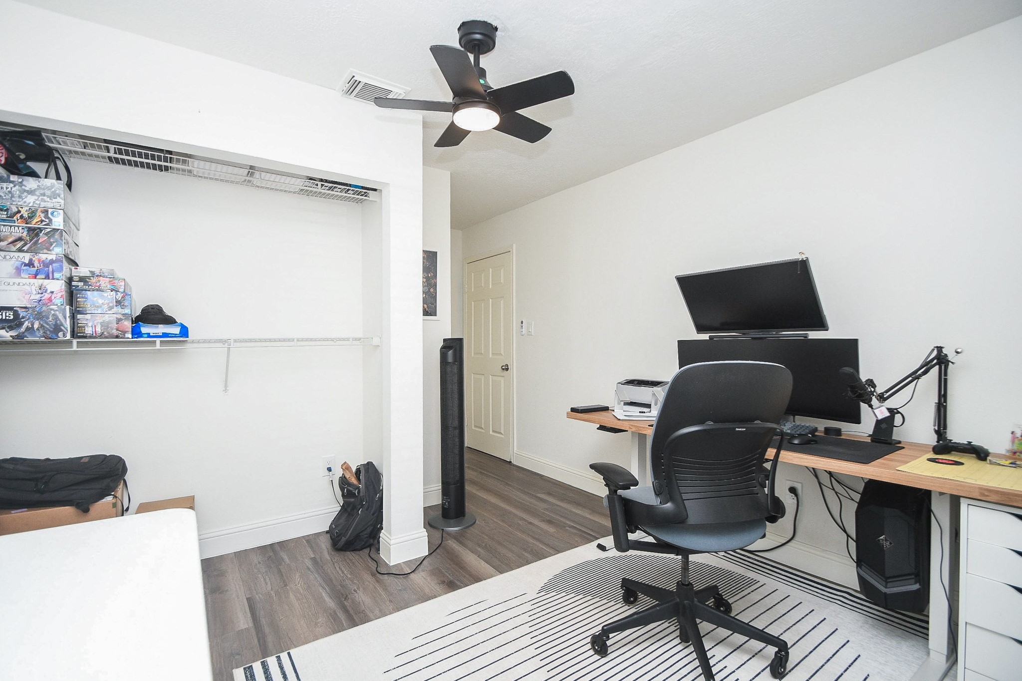 11443 Newbrook Drive Houston, TX 77072 - Photo 25 of 31 a work room with furniture and wooden floor