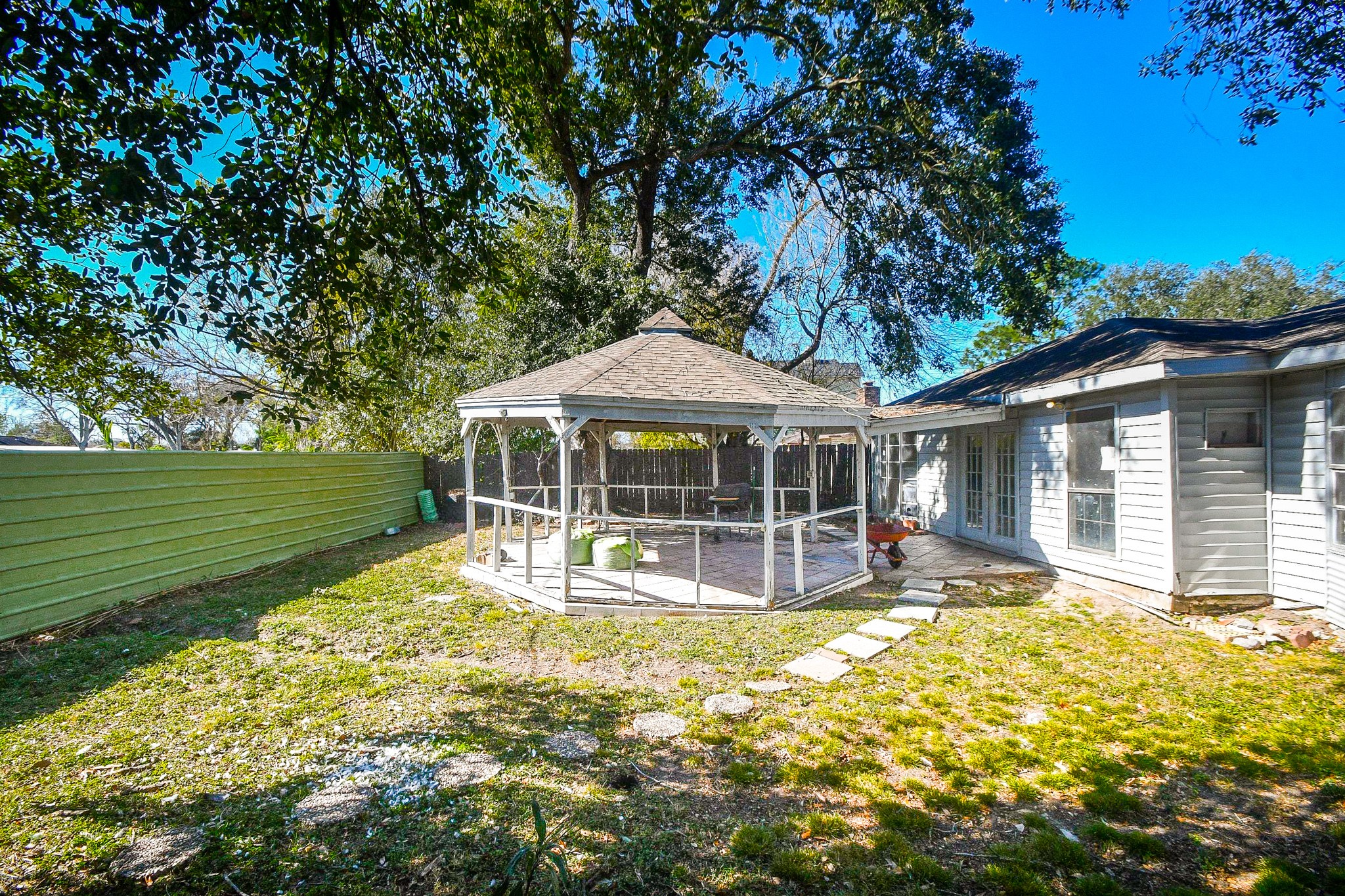 11443 Newbrook Drive Houston, TX 77072 - Photo 31 of 31 a view of a house with a yard