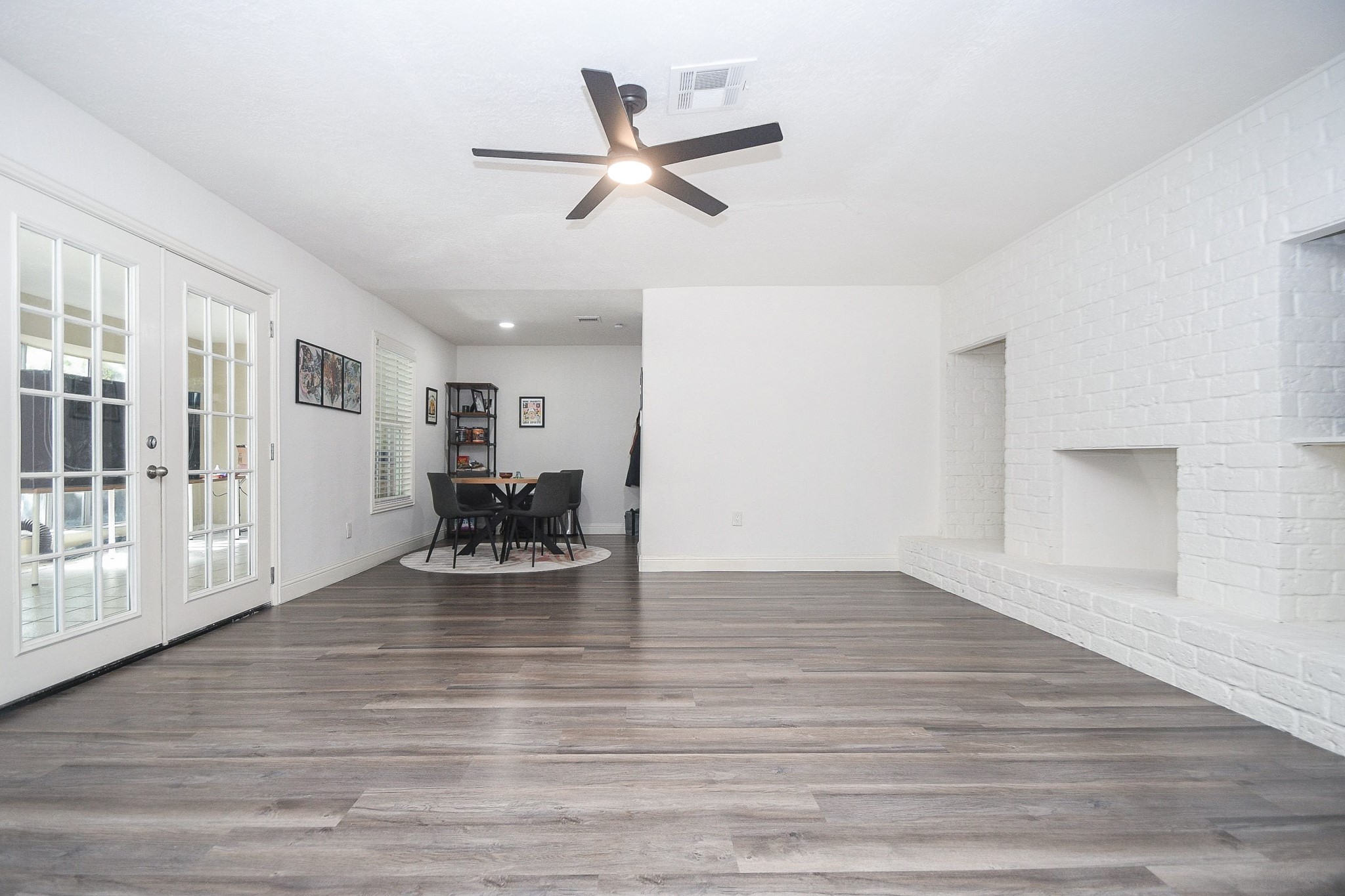 11443 Newbrook Drive Houston, TX 77072 - Photo 6 of 31 a living room with furniture and a wooden floor