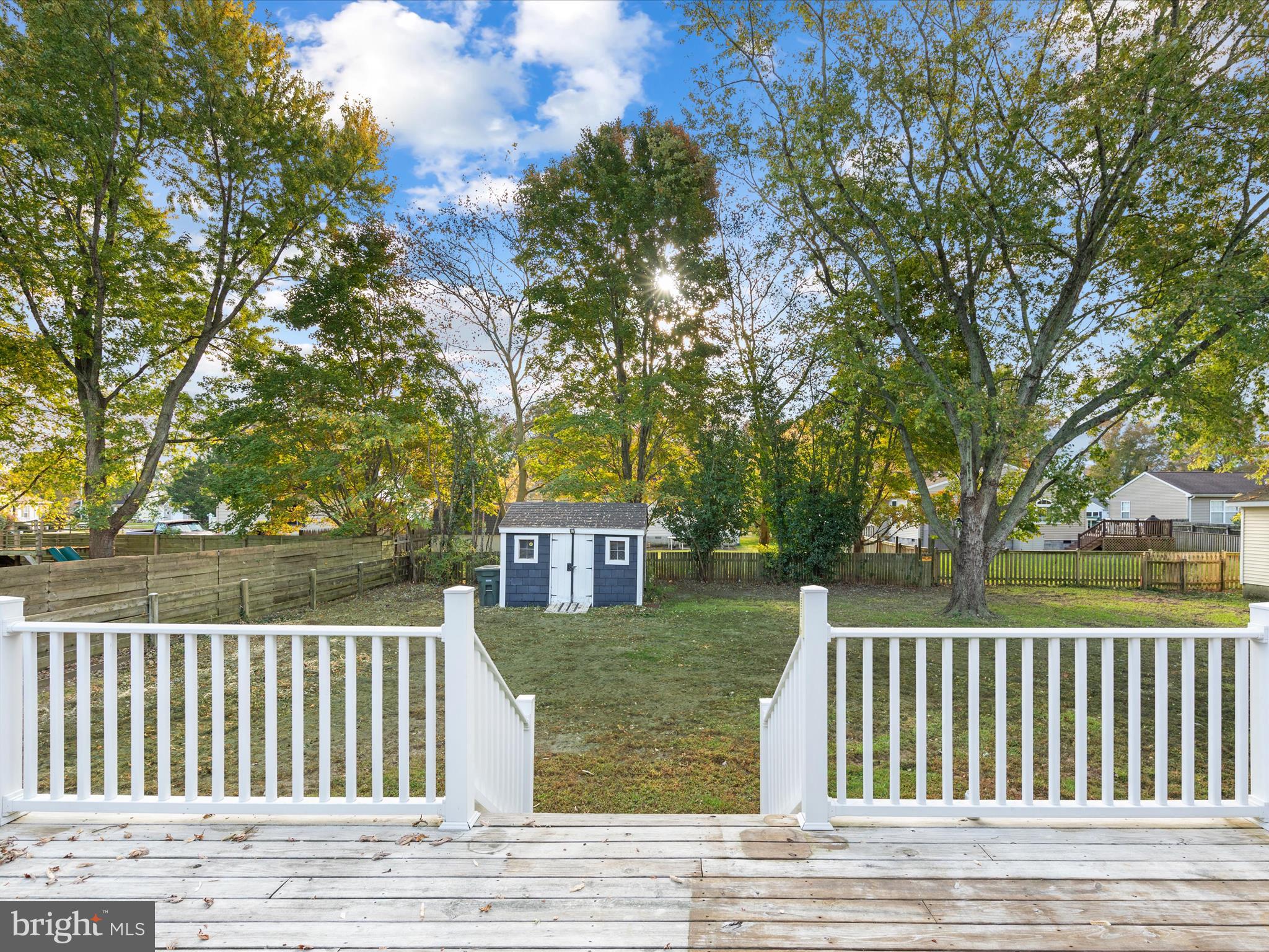 403 West Street Berlin, MD 21811 - Photo 23 of 34 front view of a house with a garden