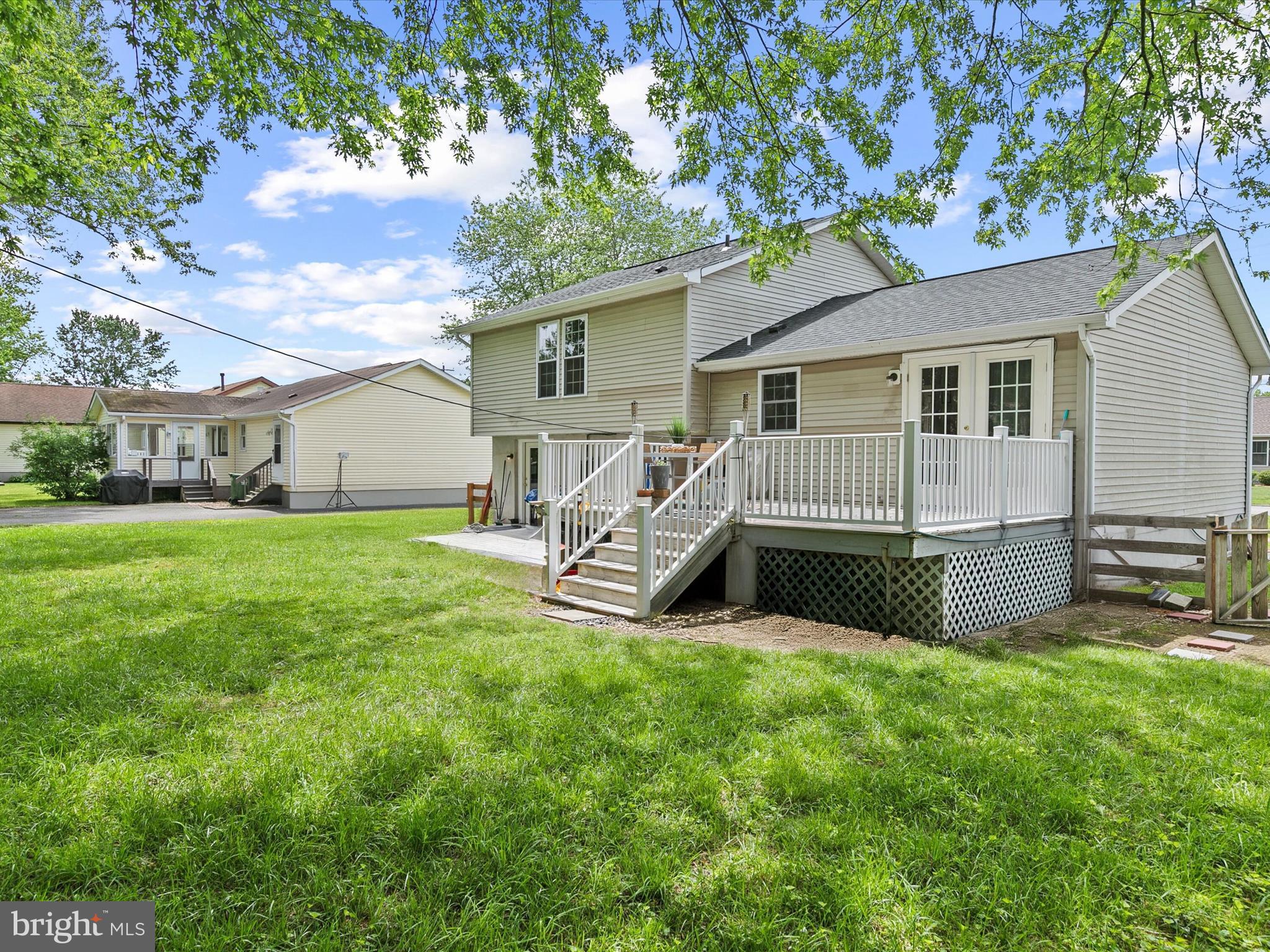 403 West Street Berlin, MD 21811 - Photo 27 of 34 a view of a house with a yard and sitting area