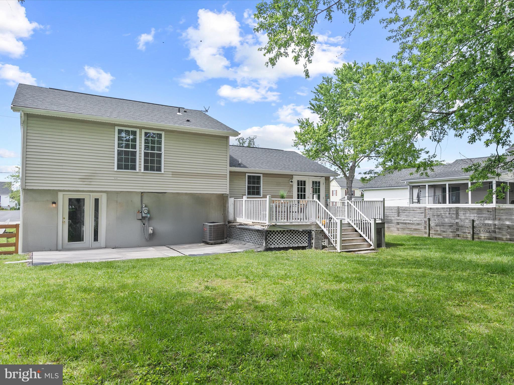 403 West Street Berlin, MD 21811 - Photo 29 of 34 a front view of a house with a yard and sitting area